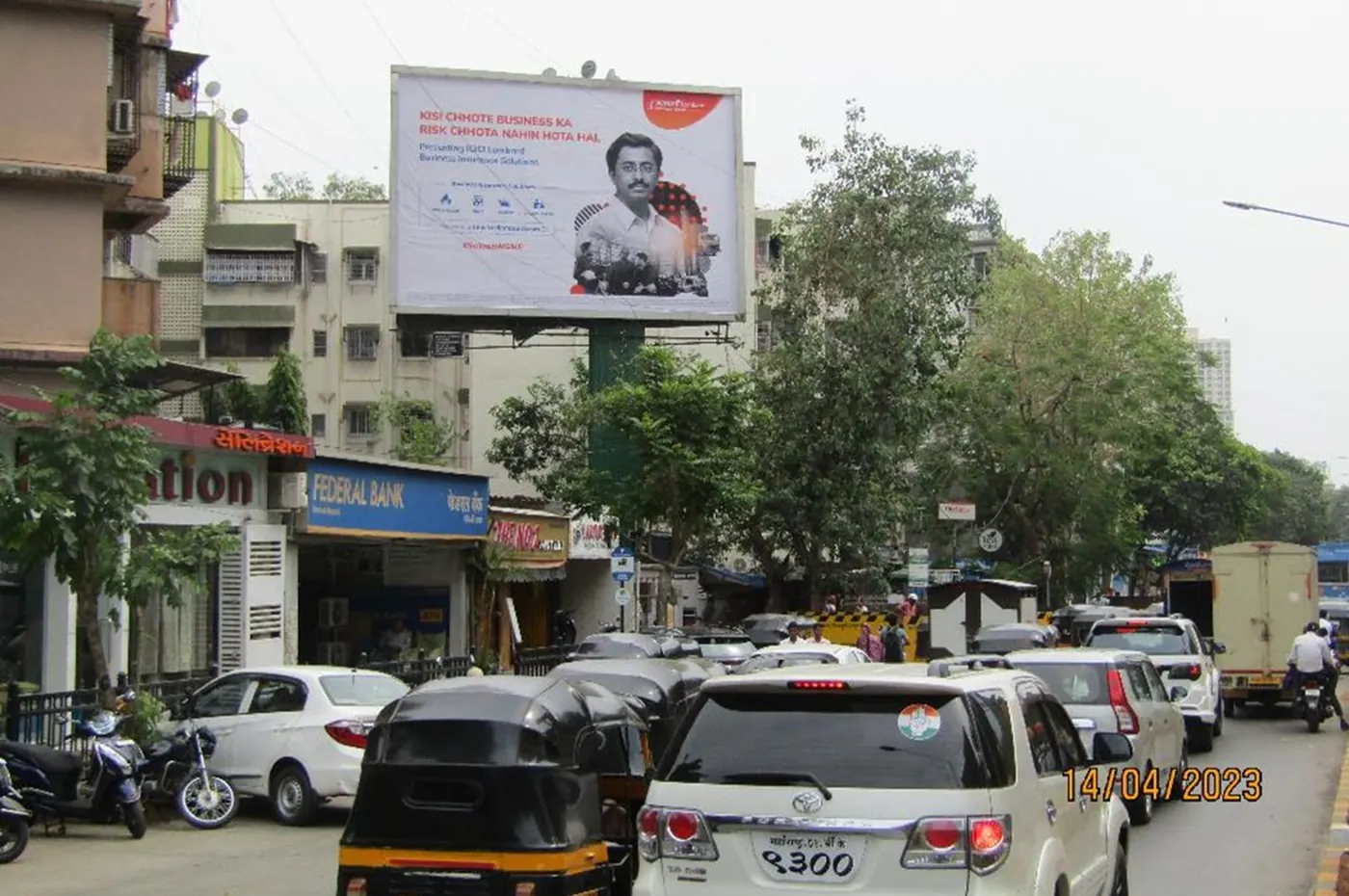 Outdoor hoarding on a busy Mumbai road
